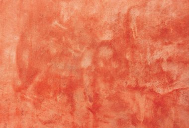 Koyu sert yüzeyi olan yeni turuncu beton duvar