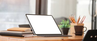 Workspace desk and laptop. copy space and blank screen. Business image, Blank screen laptop and supplies.	