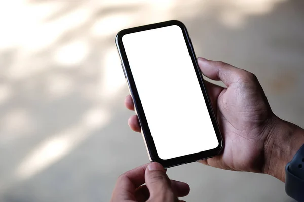 Young Man Holding Mockup Smart Phone Empty Screen Close — Stockfoto