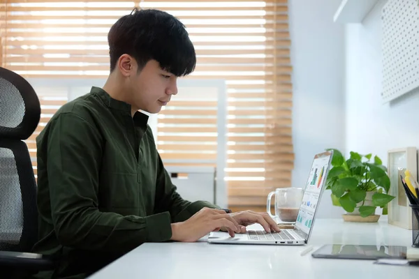 Handsome Young Asian Man Working Online Laptop Computer Modern Home — Stock Photo, Image