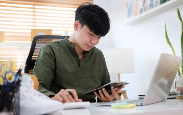 Smiling Young Asian Man Small Business Entrepreneur Working Home Office — Stock Photo, Image