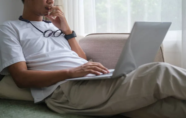 Young Man Casual Clothes Surfing Internet Laptop Computer While Sitting — 스톡 사진