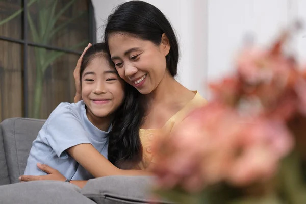 stock image Happy mother hugging adorable little daughter. People and family concept