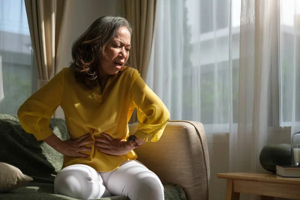 Unhappy Mature Woman Putting Hands Belly Suffering Stomach Ache Caused — Stock Photo, Image