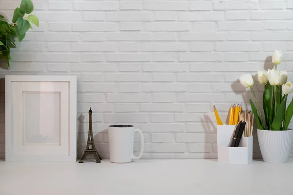 Stylish Workplace Coffee Cup Stationery Houseplant White Table Brick Wall — 스톡 사진