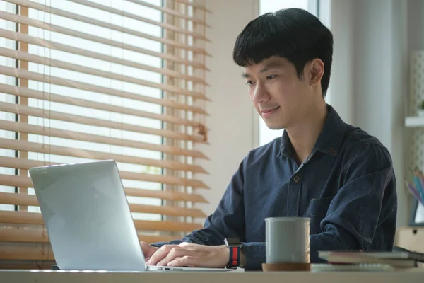 Handsome Young Businessman Using Computer Laptop While Sitting Bright Modern — 图库照片
