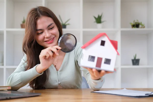 Smiling Young Woman Looking House Model Magnifying Glass Real Estate — 图库照片