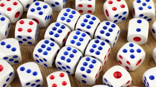 Many gambling dice cubes gamling at casino test your luck, realm of random, rotate slowly. — Stockvideo