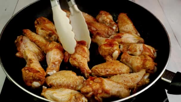 Many Sprinkled Spices Sliced Chicken Wings Preparation Turning Hot Frying — Video Stock