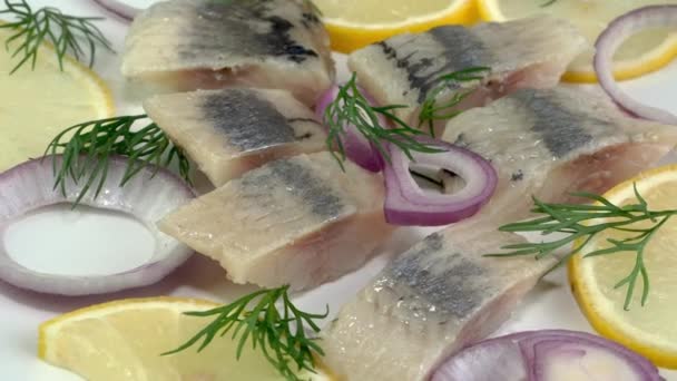 Tasty Chopped Salted Herring Fish Fillet Onion Rings Lemon Dill — Vídeo de Stock