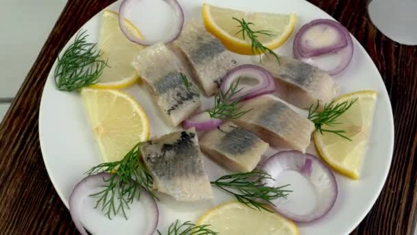 Tasty Chopped Salted Herring Fish Fillet Onion Rings Lemon Dill — Vídeo de Stock