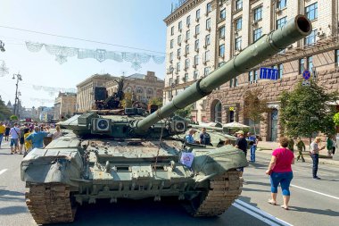Kyiv, Ukraine, August 2022: - Russian battle tank knocked and destroyed during war Ukraine against Russian aggression are showing to people, on Khreshchatyk in Kyiv. Selective focus. Close up.