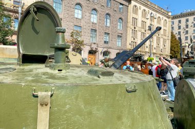Kyiv, Ukraine, August 2022: - Russian battle military gun knocked and destroyed during war Ukraine against Russian aggression are showing to people, on Khreshchatyk in Kyiv. Selective focus. Close up.