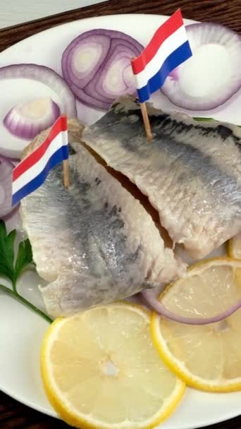 Tasty Salted Herring Fish Fillet Onion Rings Lemon Parsley Netherland — Vídeo de Stock
