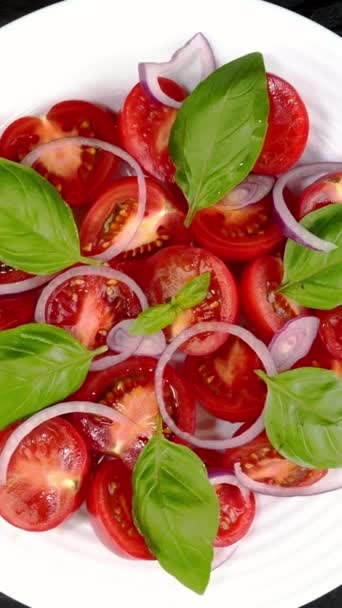 Tomato Salad Basil Chopped Onion White Ceramic Dish Rotate Slowly — Stock video