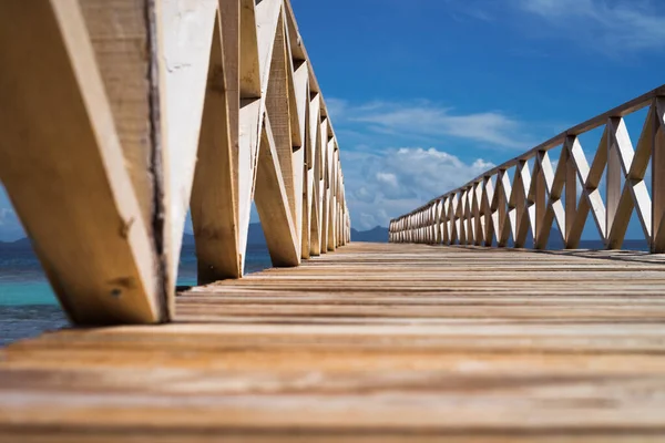 Wooden bridge during the sunset near the Bum bum island in Semporna, Borneo Sabah.