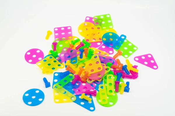 Színes Műanyag Puzzle Különböző Formákban Elszigetelt Fehér Háttér — Stock Fotó