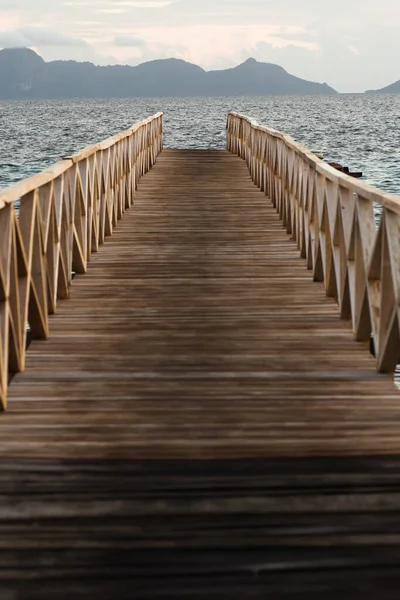 Wooden bridge during the sunrise near the Bum bum island in Semporna, Borneo Sabah.