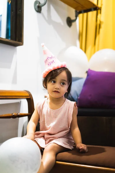 Asian Toddler Girl Celebrating Birthday Wearing Pink Hat Holding Baloon — Stock Photo, Image
