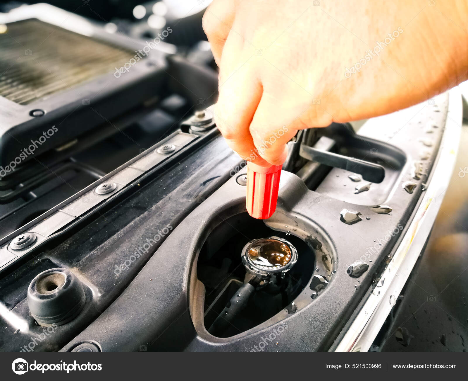 Pouring Water Radiator Car Using Water Hose Car Maintenance Stock Photo by ©ellinnur 521500996