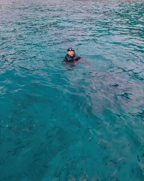 Asian Man Wearing Snorkel Floating Open Water Surrounded Fishes — 스톡 사진