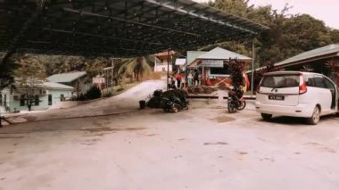  Perak, Malaysia - Aug 13 2022 People register check-in at Ulu River Lodge office