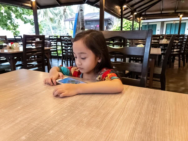 Young Girl Sitting Table Using Mobile Phone — Foto Stock