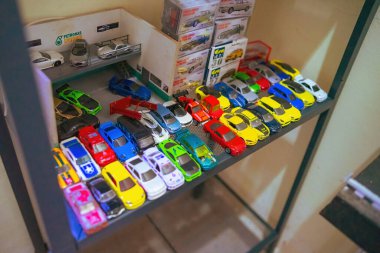 Perak, Malaysia - Aug 12, 2022 : Hotwheels toy cars on display on the shelf. Hotwheels is a product of Mattel, with factories located in Penang, Malaysia and Thailand