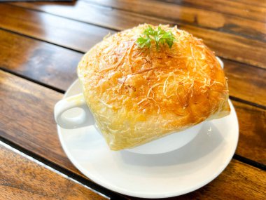 Zuppa toscana or bread or Tuscan or Minestra Pane or Zuppa soup. Made from kale, zucchini, beans, potatoes, celery, carrots, onion, tomato pulp, extra virgin olive oil, chili and chicken or bacon.