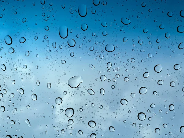 Waterdruppels Perspectief Door Glazen Oppervlak Tegen Blauwe Lucht Goed Voor — Stockfoto