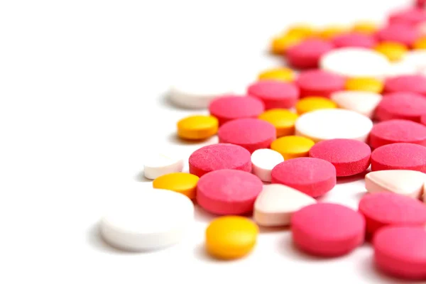 Several kinds of drug tablet isolated on the white background