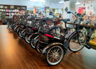 Cirebon Indonesia-August 14, 2022: handicrafts in the form of bicycles from copper