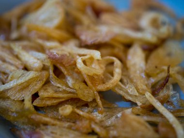 Fried red onion macro photography