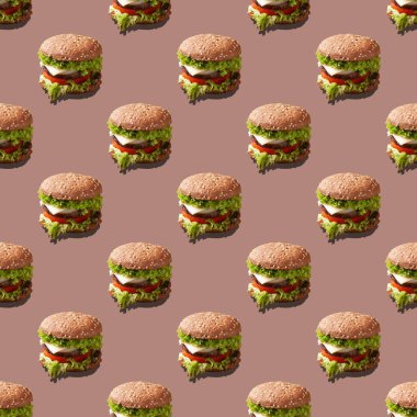 Bej arka planda gölgesi olan kusursuz desenli burger.