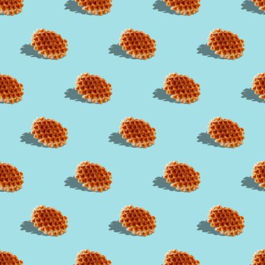 Mavi arkaplanda gölgeli waffle 'lar