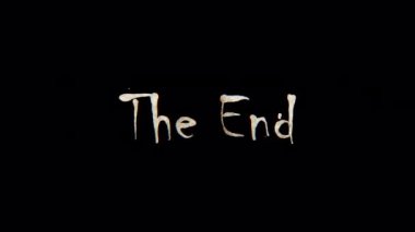 Burn text of The Ene word. The golden shine lighting of The End word loop animation promote advertising concept isolate using QuickTime Alpha Channel ProRes 4444.
