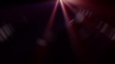 Yukarıdan portakal ışığının soyut arkaplan ışınları. Yan köşegen ışık optik mercek parlak animasyon sanat arka planı 4 K döngüsü. Güneş ışınları simülasyonu etkinleştirildi. Proje örtüşmesi için