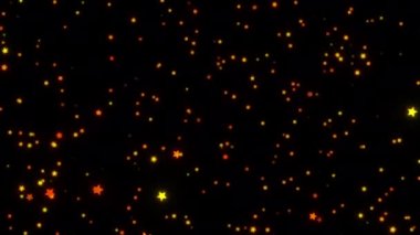 Siyah zemin üzerine parlayan yıldız parçacıkları düşen güzel döngülü turuncu. Proje ekranı kaplaması için 4K pürüzsüz yeni yıl temalı arkaplan