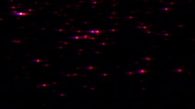 Parlak pembe kırmızı parçacıklar siyah arkaplana düşer. 4K 3D kırmızı pembe parlayan dijital animasyon 