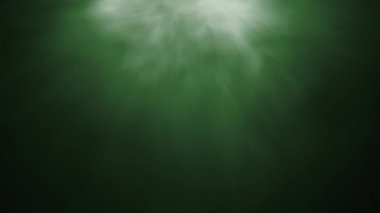 4K soyut döngü üst merkez yeşil duman bulutu koyu arkaplanda ışık döngüsü animasyon sanatı. Aydınlatma lambası etkisi dinamik mavi renk 