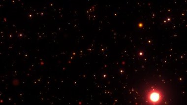 Parıldayan turuncu kırmızı parçacıklar siyah arka plana düşüyorlar. 4K 3D ateşli turuncu parlayan kor yanan kül parçacıklarının animasyonu. projenizi kaplamak için kullanılabilir