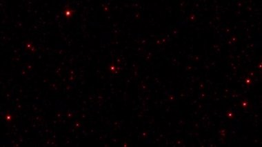 Loop glow orange red star particles fire falling down on black background for project screen overlay. 4K 3D animation of fiery red orange glowing flying ember burning ash particles.