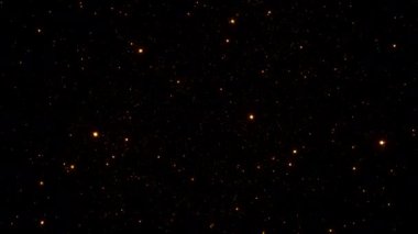 4K 3D seamless loop of glowing flicker orange red particles stars animation on black background flow to front.Graphic motion for screen overlay.Effect loop with galaxy sky particles twinkling light in the space