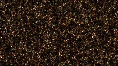 4K döngüsü düşen parlak altın kar tanesi animasyonu siyah arkaplanda. Kış karı, Noel ve yeni yıl arkaplanı için bulanık bokeh ile altın kar taneleri animasyonu. Kar Tanesi Kar Tanesi 
