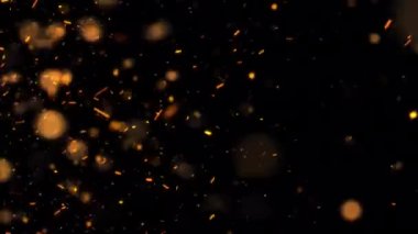 Soyut dikişsiz ateş parçacıkları projenizi kaplamak için yükselen kül kıvılcımları. Proje ekran örtüsü için alfa kanalı quicktime prores 444 ile izole edilmiş. 4K 3D kaotik ateşli turuncu hareket 