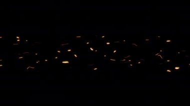 Soyut dikişsiz döngü sarı bokeh parçacıkları siyah arkaplan üzerinde soldan sağa doğru akar. Hareket grafikleri. Fesif arkaplan. 4K yüzen parçacıklar