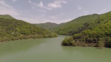 aerial lake, mountains and sky