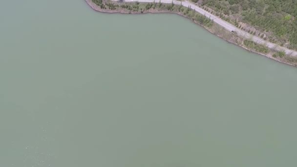 Aerial road and lake — Vídeos de Stock