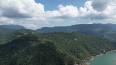 lake and mountains, aerial lake and mountains with white clouds hyperlapse