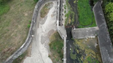 ruined dam, aerial ruined dam and dry river